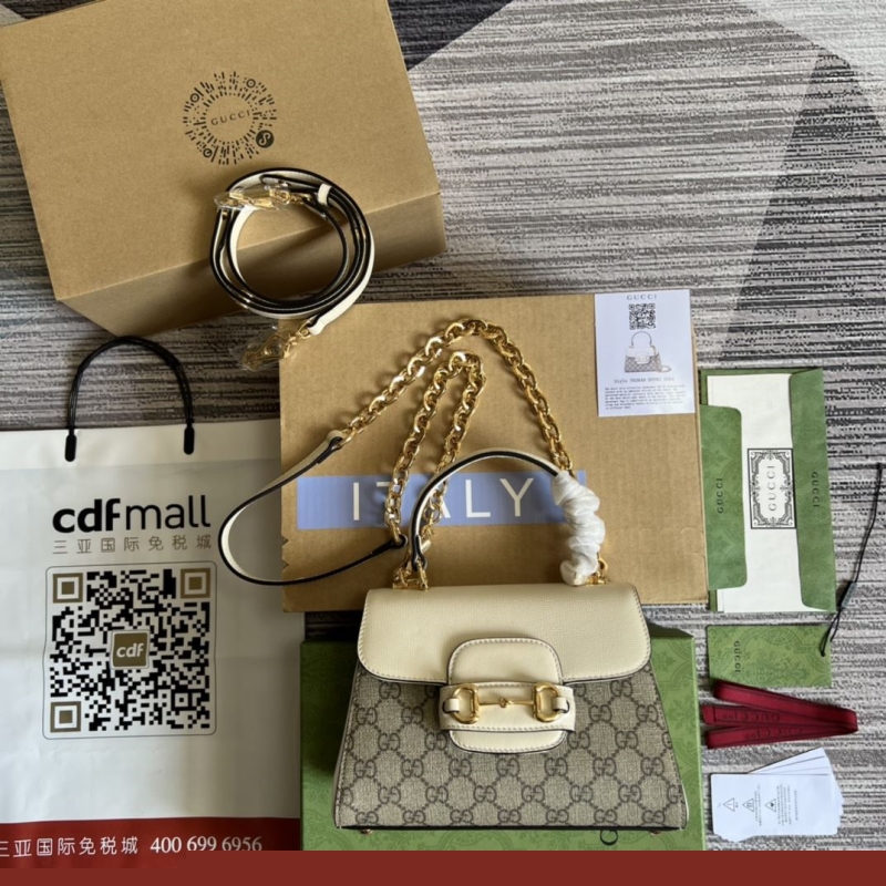 G*u*i top handle bags
